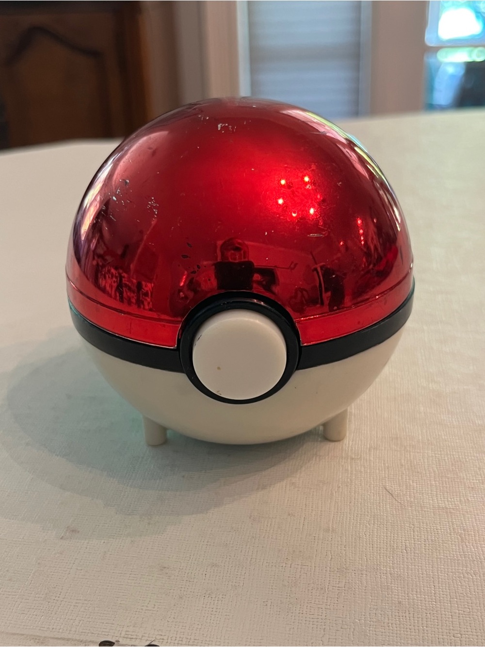 Vintage Nintendo Pokemon metallic red and white pokeball. Light scratches